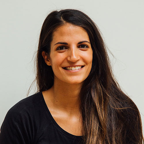 A Girl is Smiling and looking at the camera