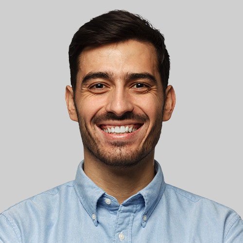A Man in Sky Blue Shirt and Smiling