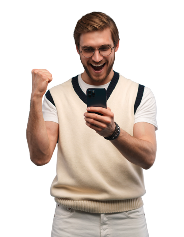 A Guy Looking at the Mobile Phone and He is Cheering